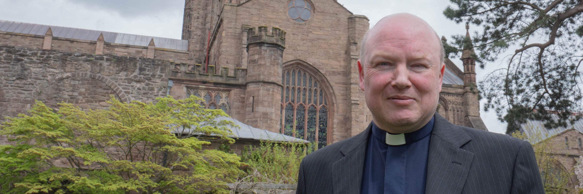 Derek Chedzey in front of Hereford Cathedral