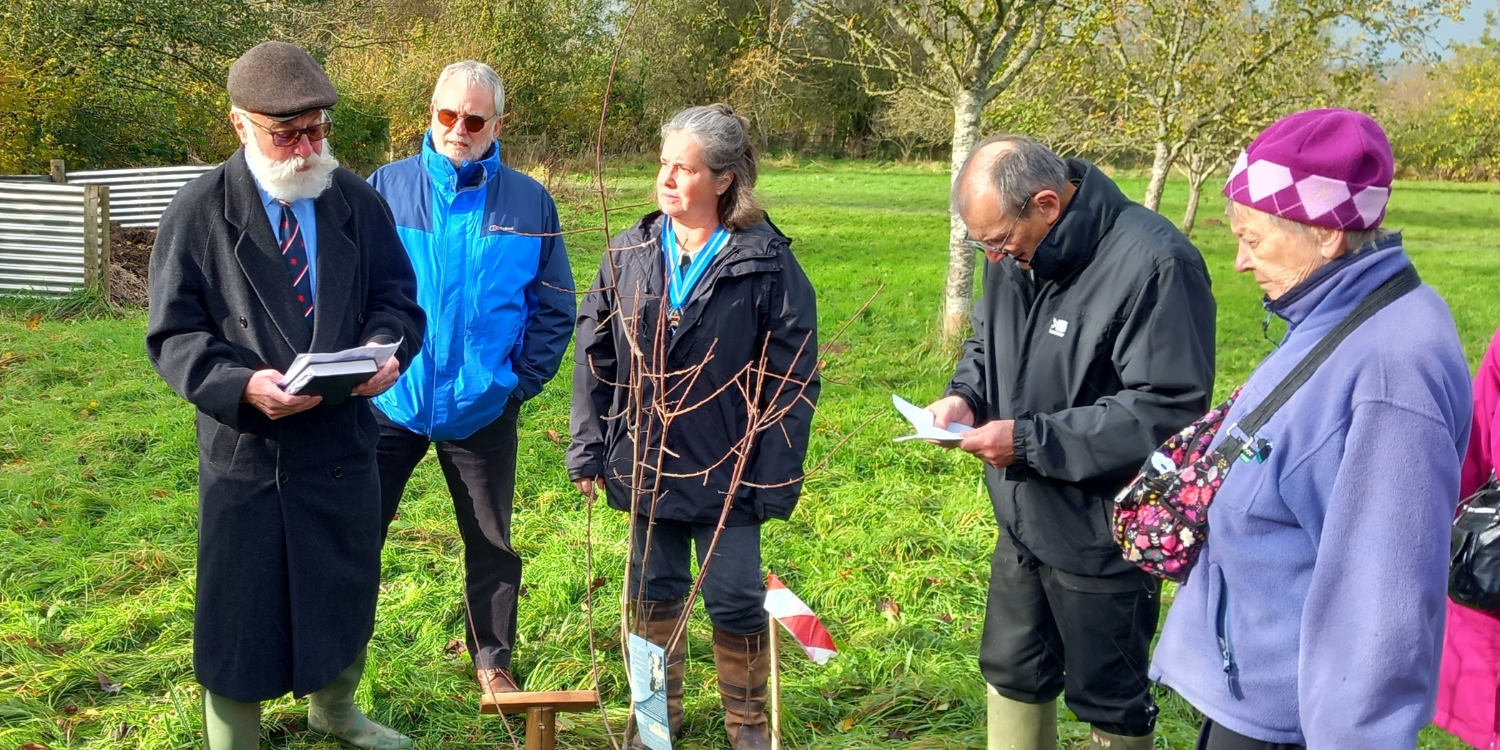 Image shows group planting the tree at Craven Arms
