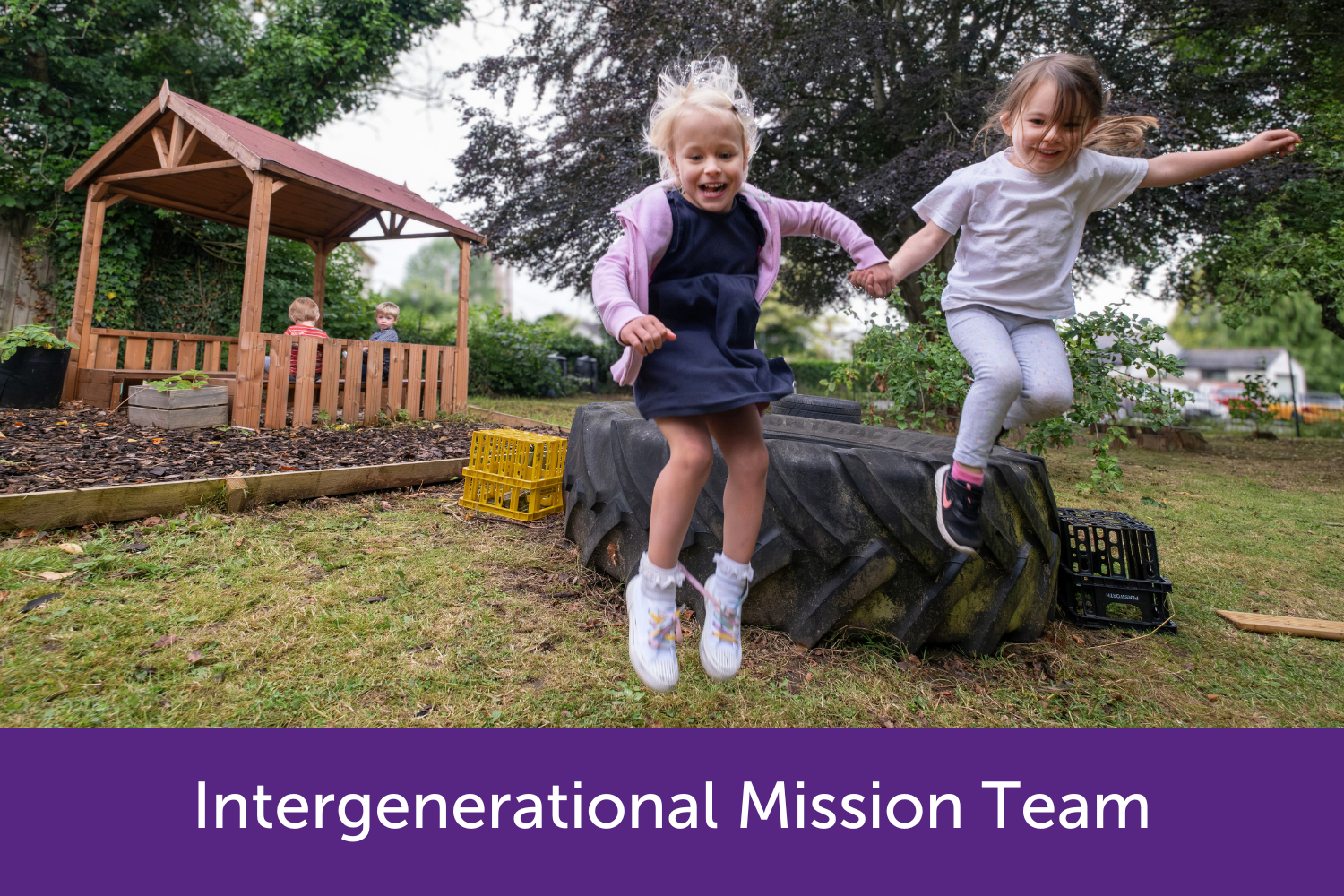 Children jumping off a big tire 
