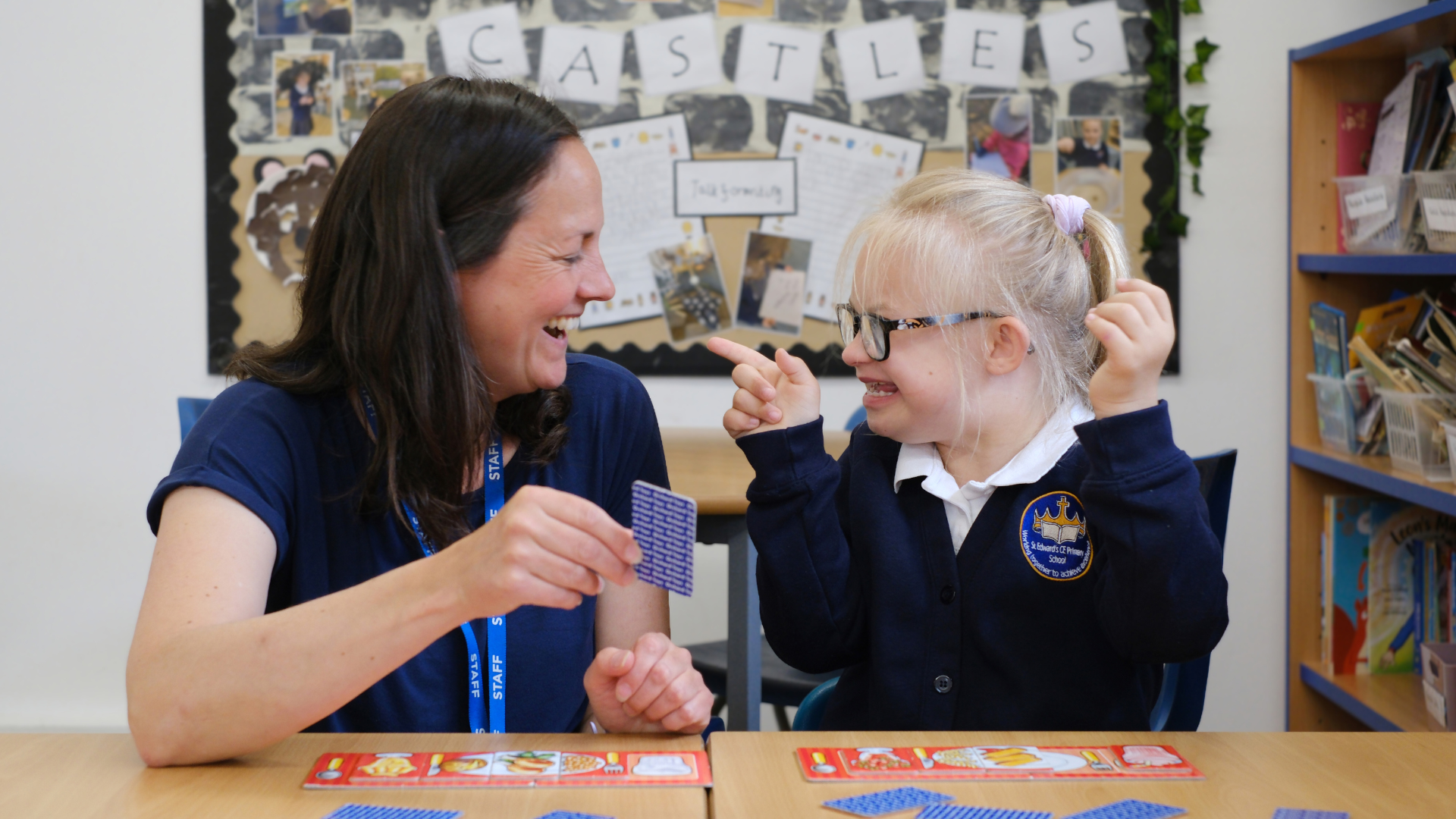 Teacher playing game with a child