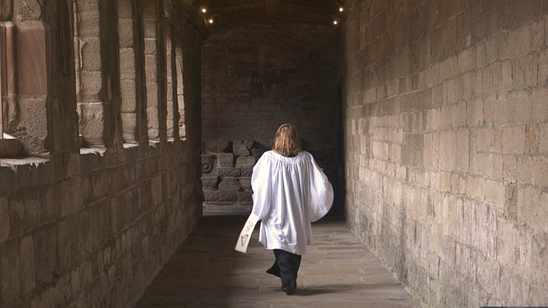 Clergy women walking alone