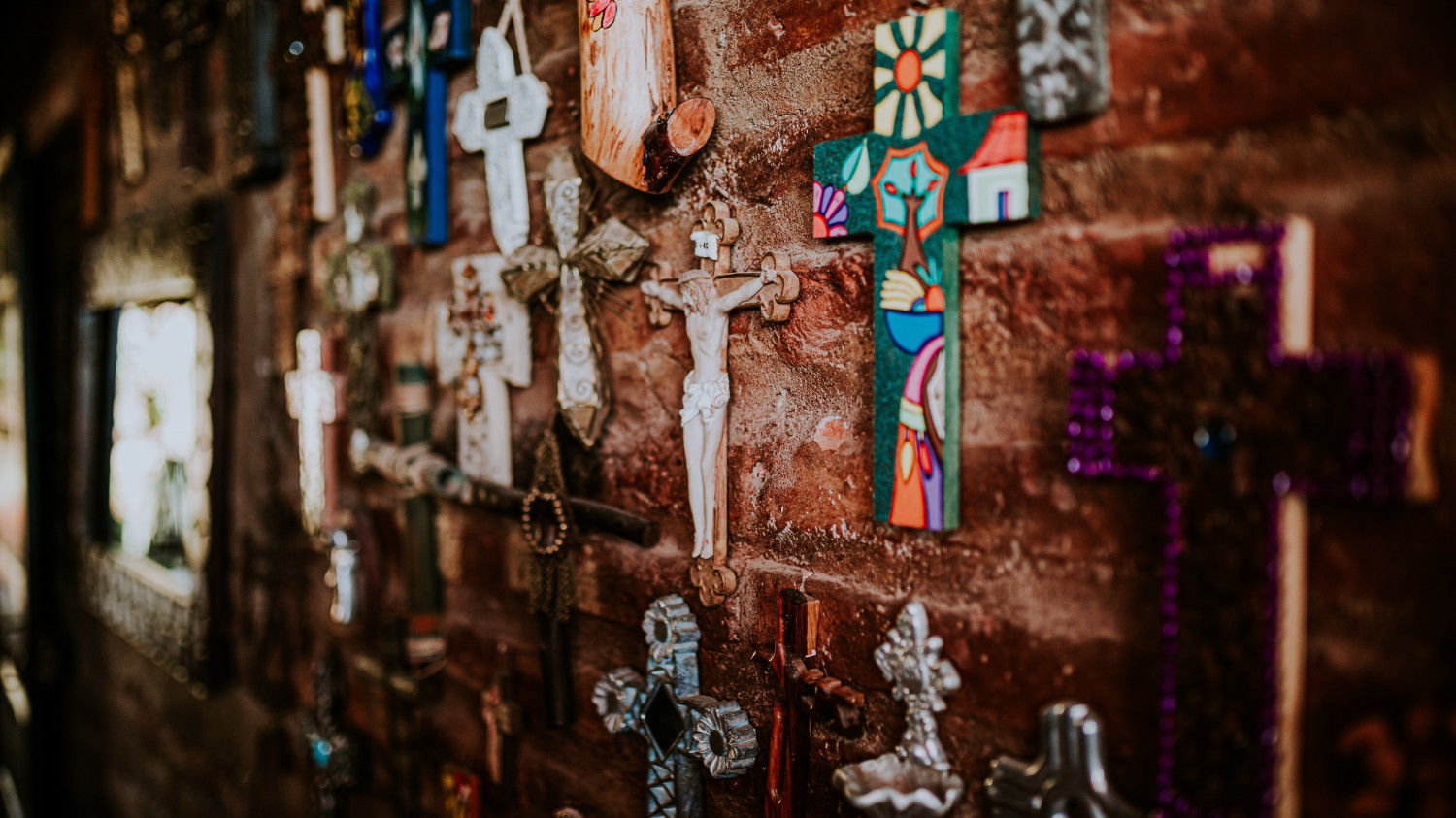 Image of a wall with various styles of the cross