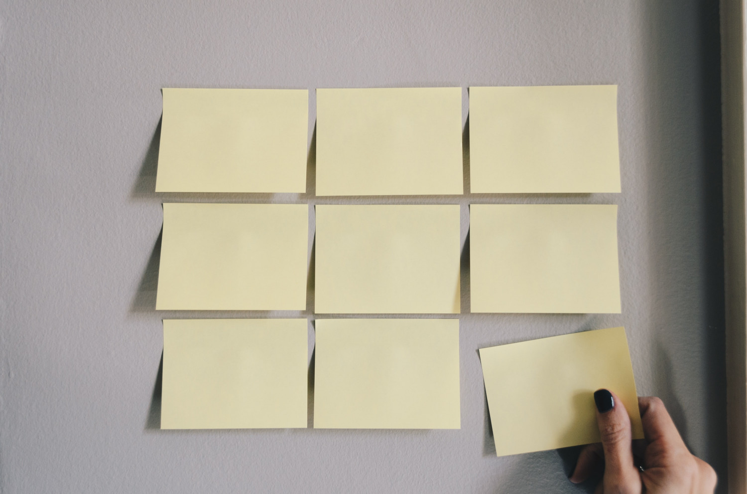 Image of Post-It notes arranged on a wall