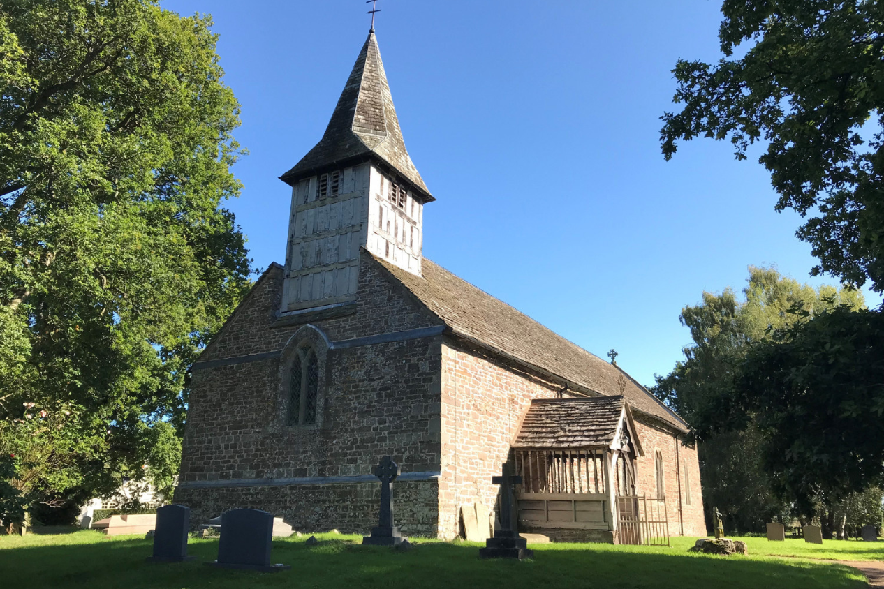 Image of a church built on a hill side