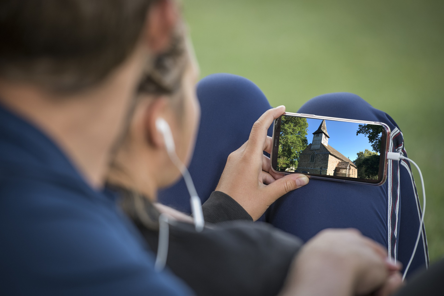 people filming on a mobile phone